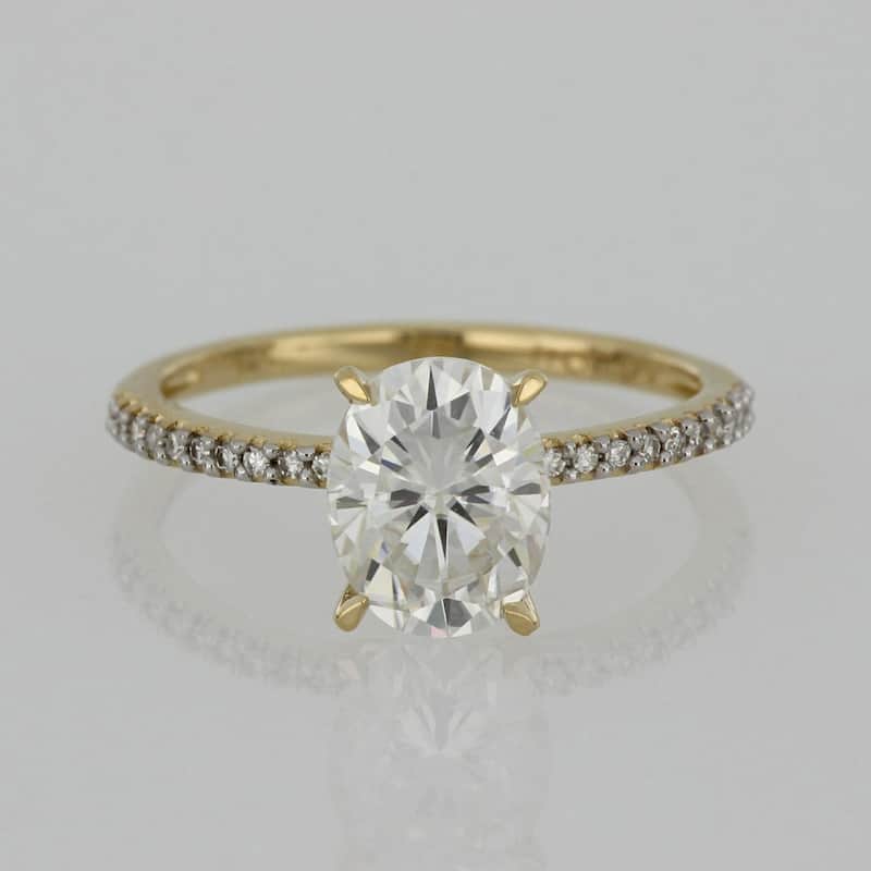 Miadora 2ct DEW Oval-cut Moissanite and 1/10ct TDW Diamond Engagement Ring in 14k Yellow Gold