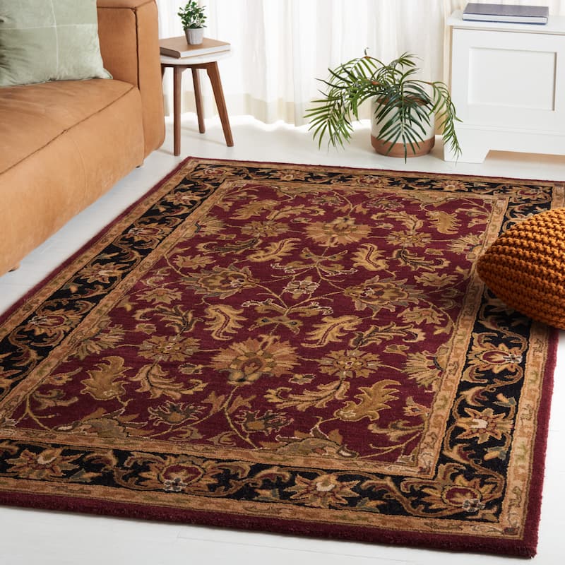 SAFAVIEH Handmade Heritage Lion Traditional Oriental Wool Rug - 4' x 6' - Red/Black