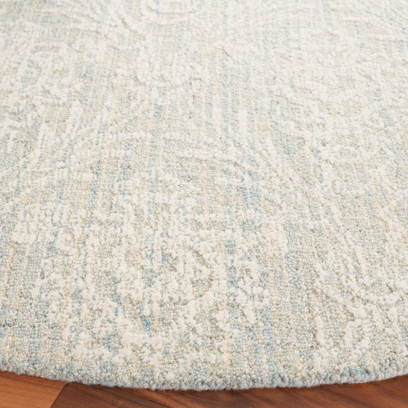 SAFAVIEH Handmade Ebony Fridbjorg Modern Wool Rug