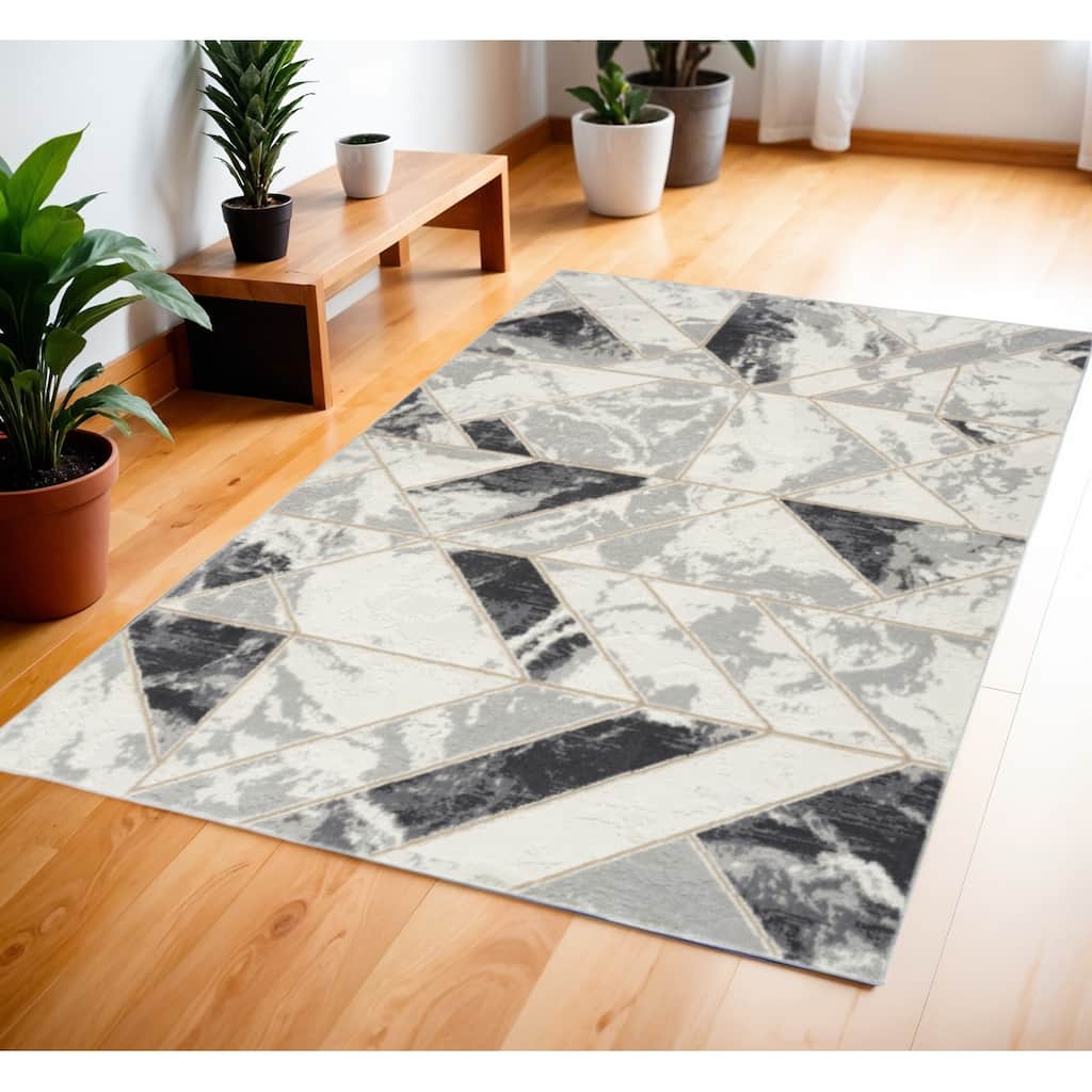 Buqa Geometric Modern Non Skid Stain Resistant Low Pile Area Rug By HomeRoots - 72' X '48' X '0.25