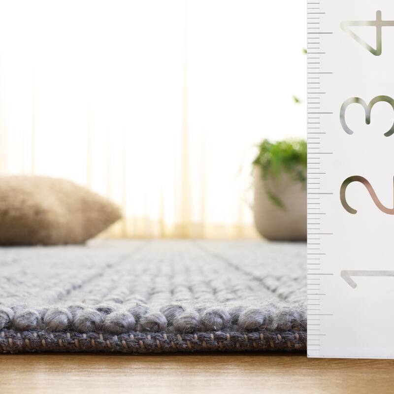 SAFAVIEH Handmade Natura Edmeia Raised Textured Wool Blend Rug