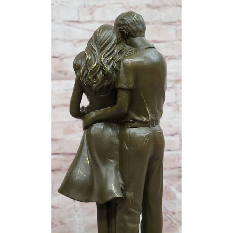 Bronze Sculpture Of Young Family Holding Newborn Baby By Milo