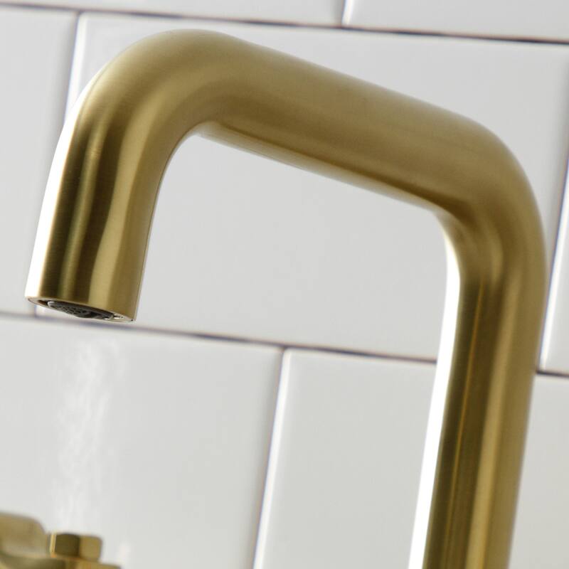 Kingston Brass Whitaker Two-Handle 3-Hole Deck Mount Widespread Bathroom Faucet with Push Pop-Up