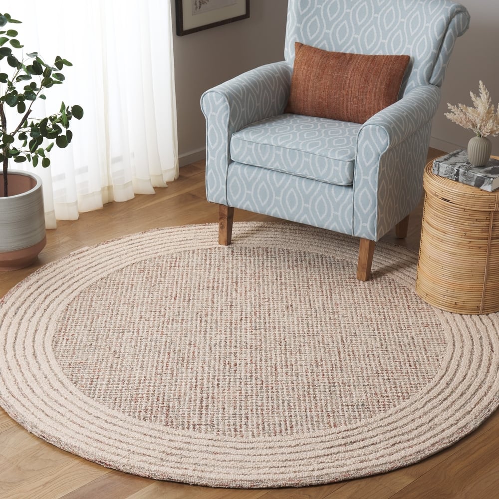 SAFAVIEH Handmade Ebony Dorith Border Wool Rug