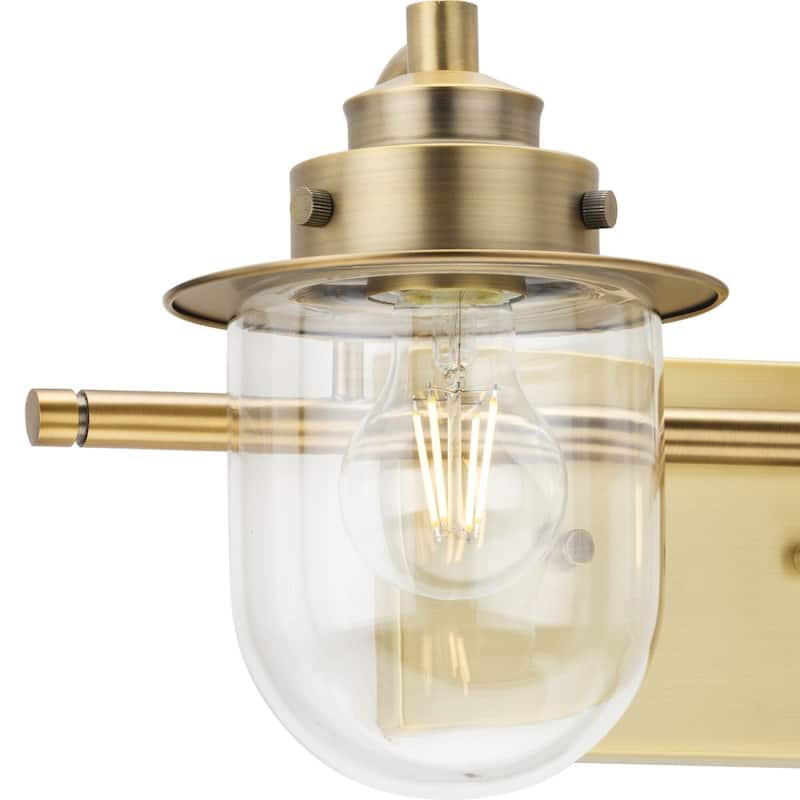Northlake Collection Two-Light Vintage Brass Clear Glass Transitional Bath Light - 15.5 in x 7.5 in x 8 in