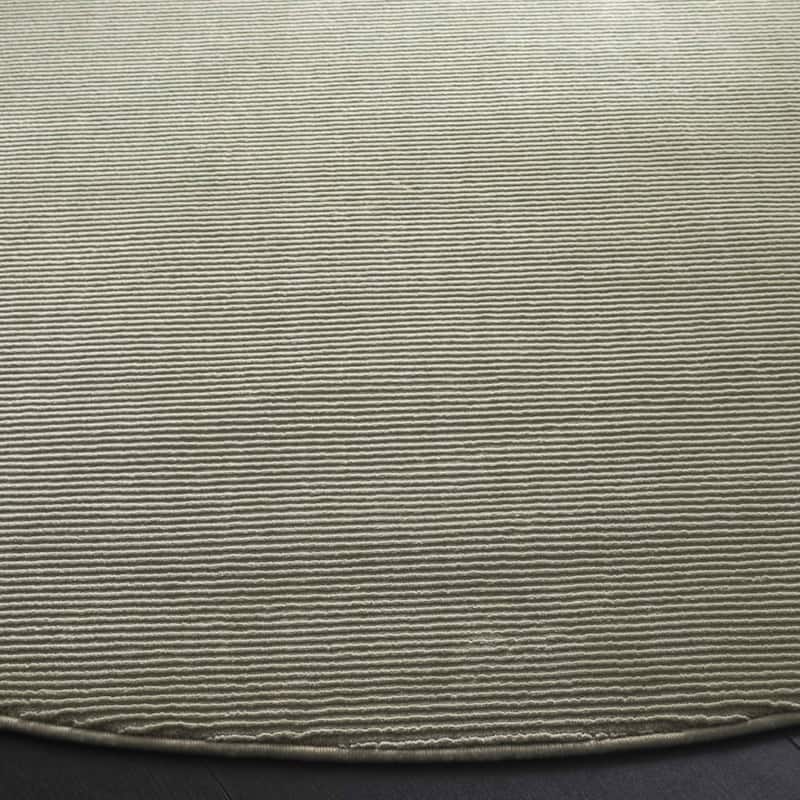 SAFAVIEH Revive Avie Solid Rug