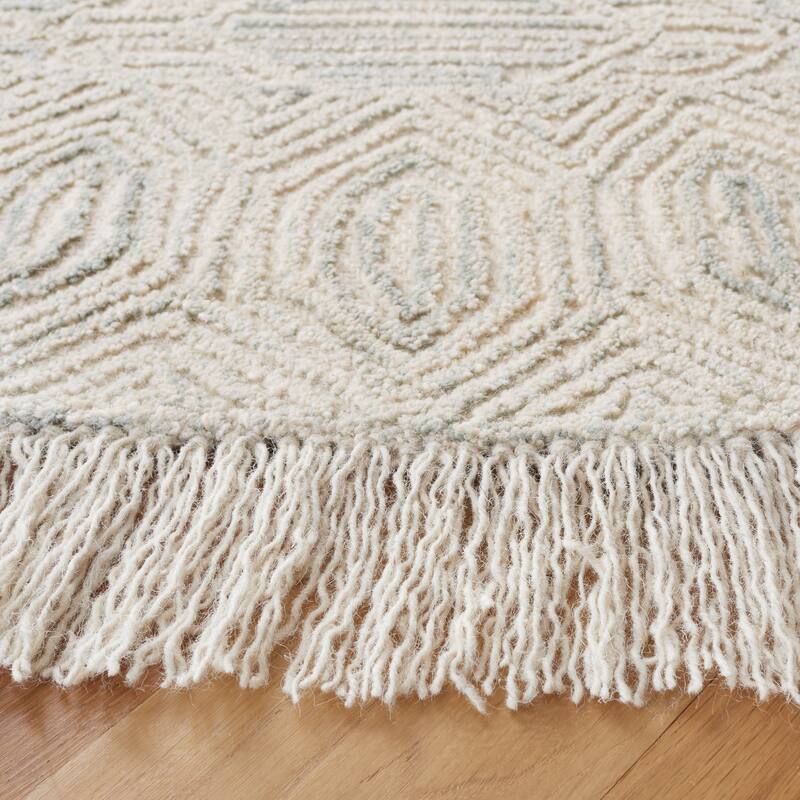 SAFAVIEH Handmade Ikat Sivan Wool Rug