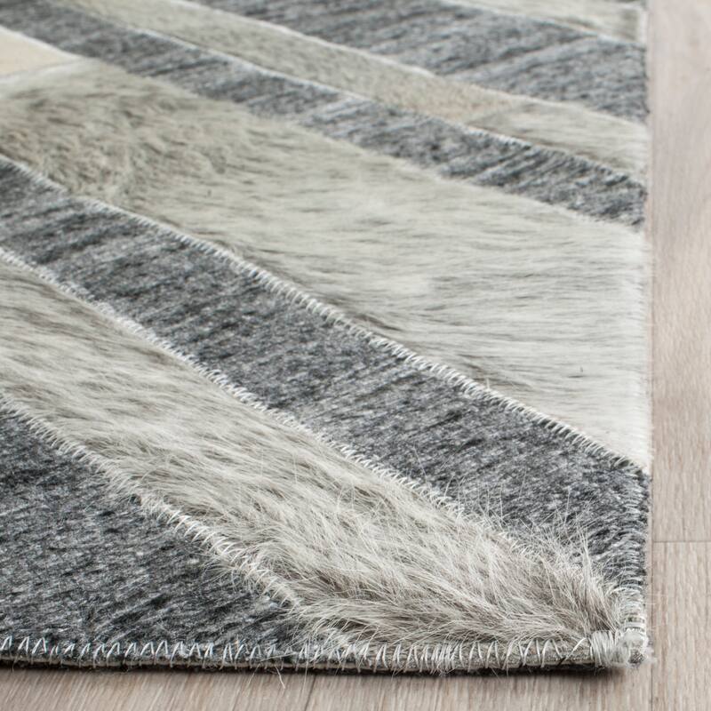 SAFAVIEH Handmade Studio Leather Pepper Modern Leather Rug