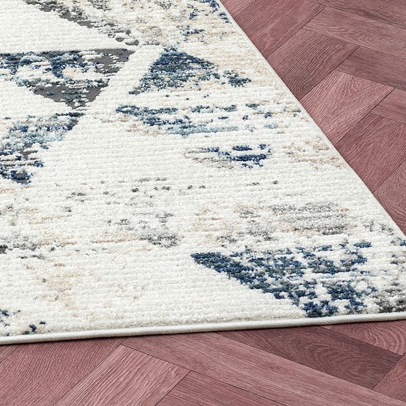 Sevita Contemporary Geometric High-Low Plush Polyester Blend Area Rug, Ivory/ Blue