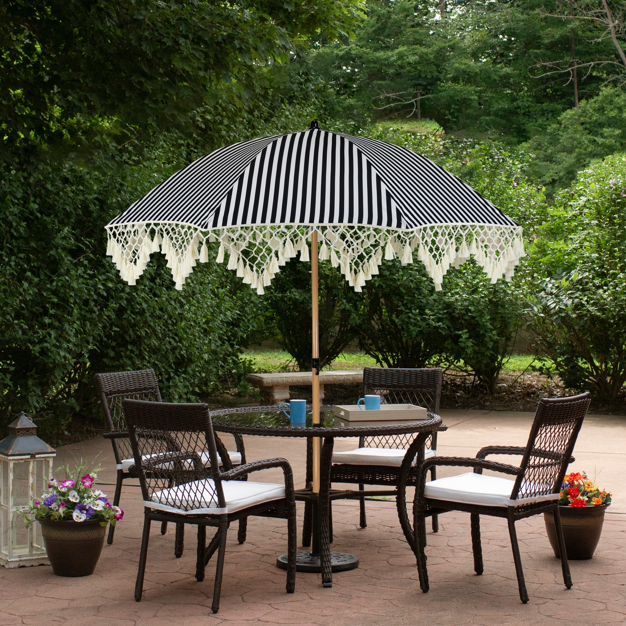 black and white striped umbrella patio Business & Pleasure Co. The dyed acrylic cover St. Tropez Striped Umbrella