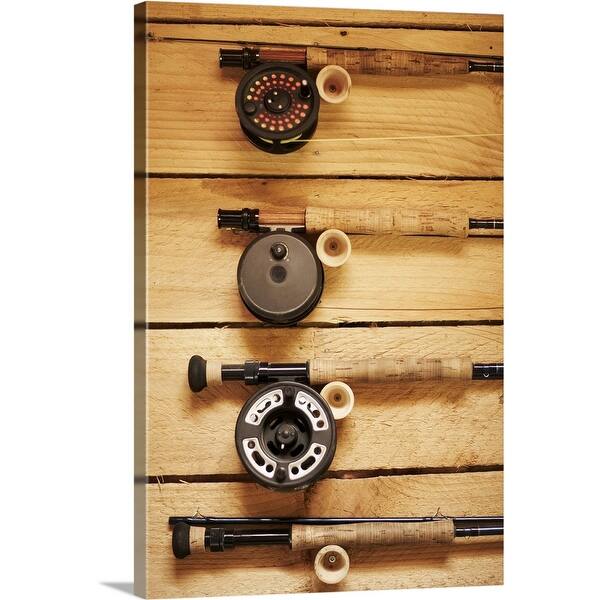 Fly fishing reels hanging on wall Canvas Wall Art - Bed Bath & Beyond -  16377119