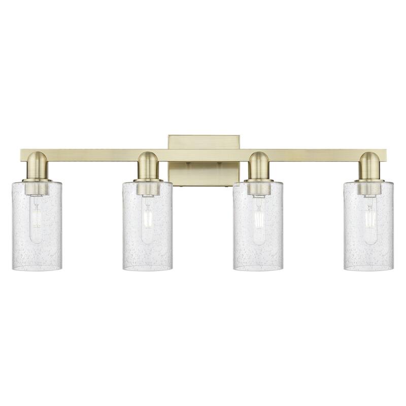 Innovations Lighting 716-4W-11-31 Clymer Vanity Clymer 4 Light 31" - Antique Brass / Seedy