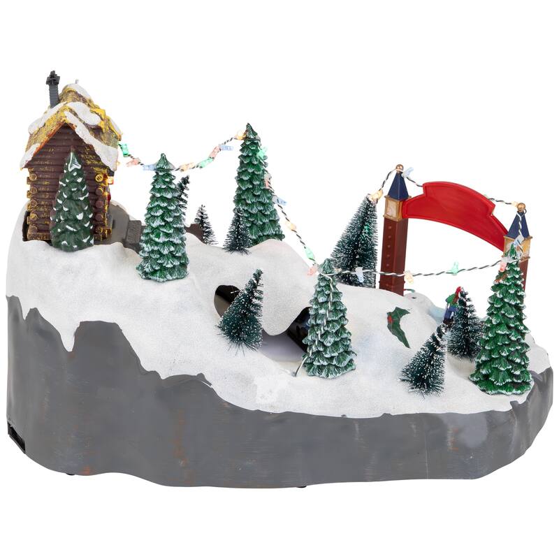 15" LED Lighted Winter Skiing Scene Animated Christmas Village Display