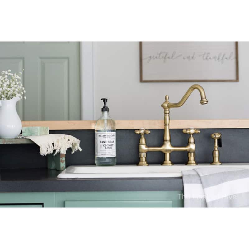 Kingston Brass Heritage Bridge Kitchen Faucet with Brass Sprayer