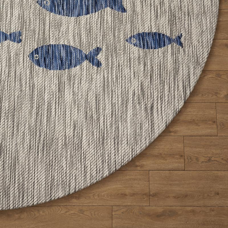 Isola Tropical Indoor/Outdoor Area Rug by Porch & Den