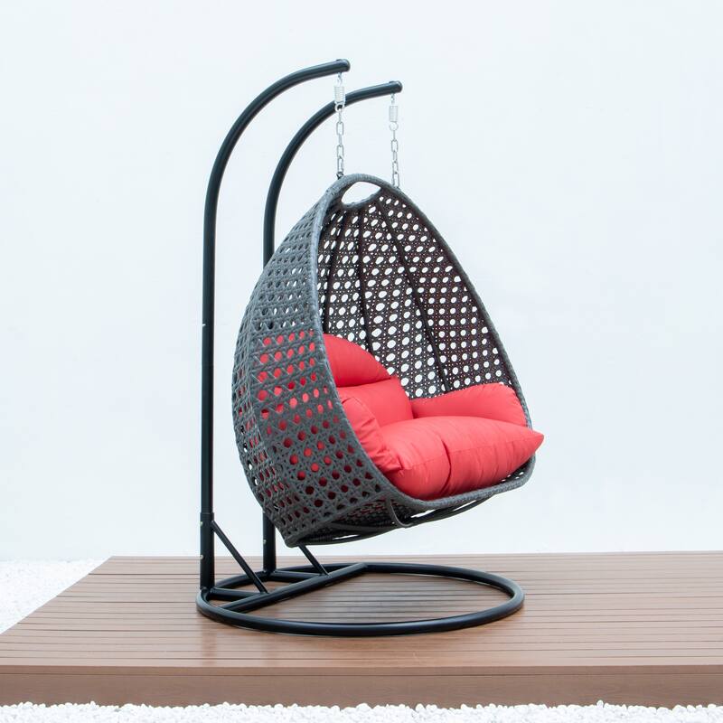LeisureMod 2-Person Hanging Egg Swing Chair with Metal Stand - Handcrafted Charcoal Wicker, Patio Hammock Lounger with Cushions