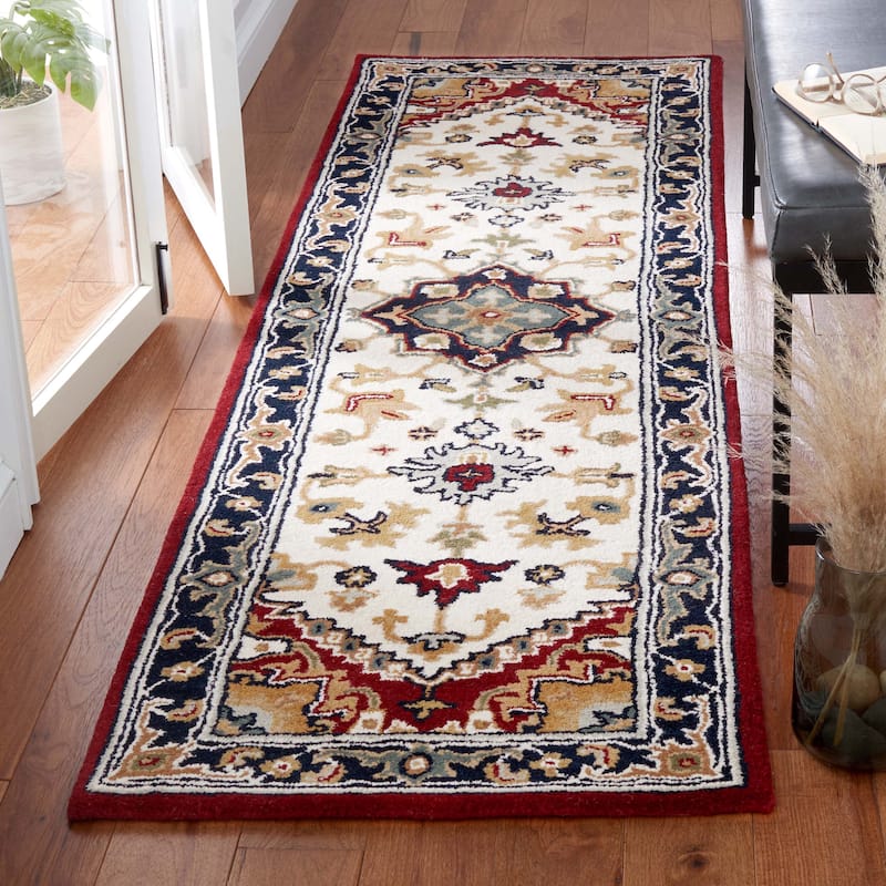 SAFAVIEH Handmade Heritage Asia Traditional Oriental Wool Rug - 2'3" x 14' Runner - Ivory/Red