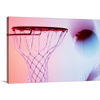 Shop Blurred View Of Basketball Going Into Hoop Canvas Wall Art