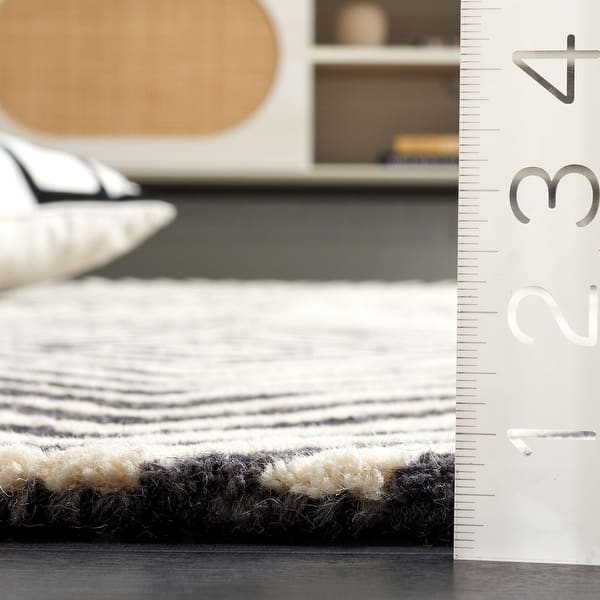 dimension image slide 1 of 2, SAFAVIEH Handmade Ebony Dyrfinna Modern Wool Rug