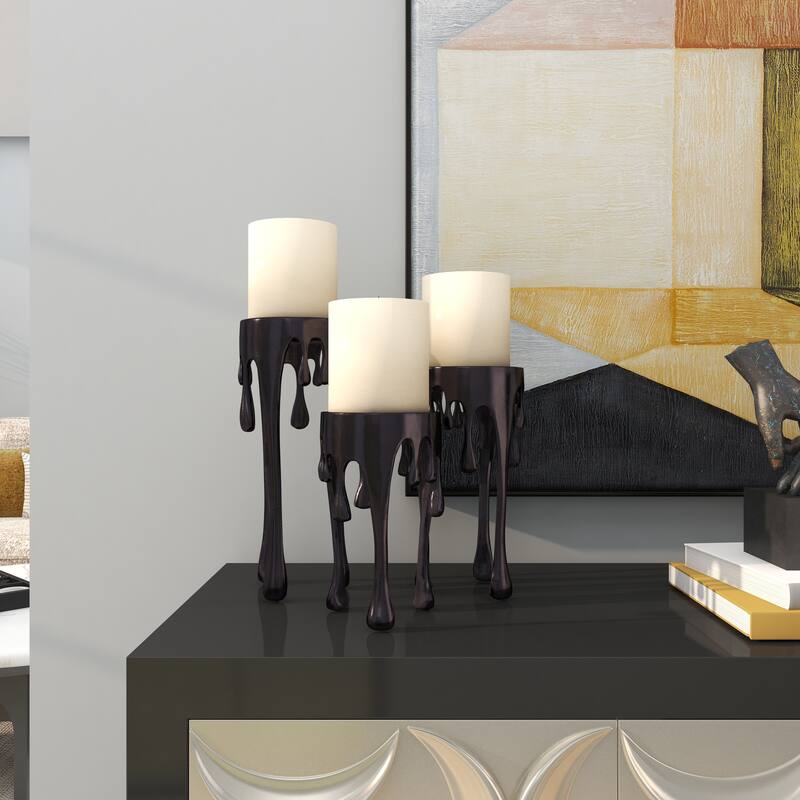CosmoLiving by Cosmopolitan Silver, Gold or Black Aluminum Abstract Pillar Drip Candle Holder (Set of 3)