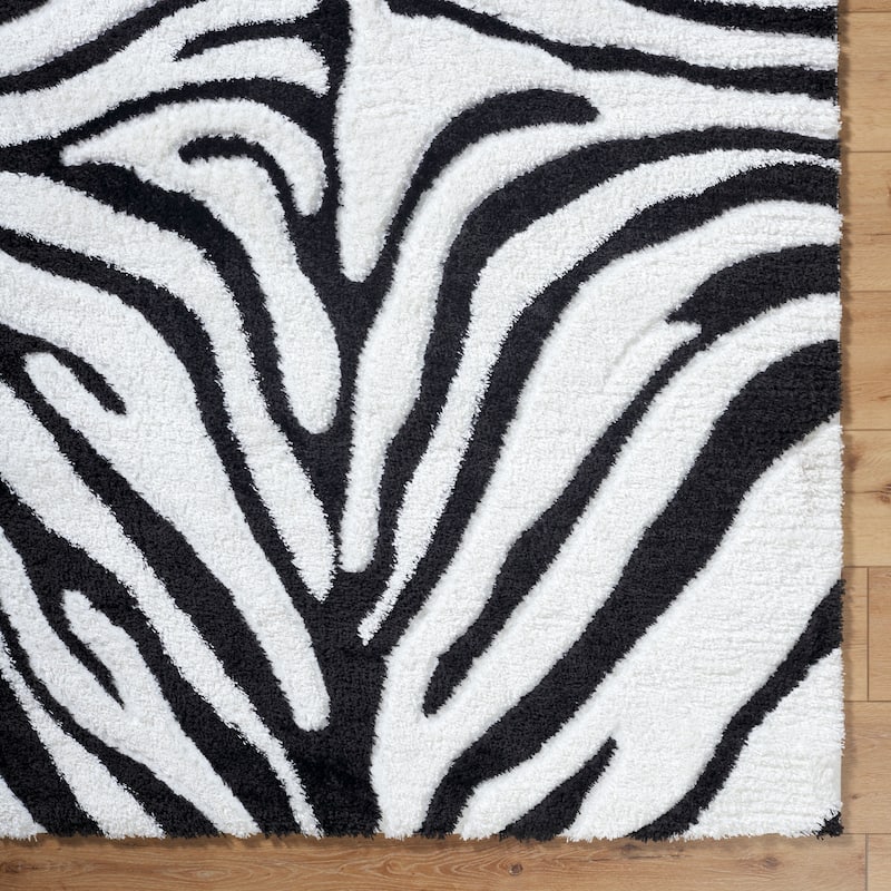 Livabliss Nomadic Animal Print Plush Area Rug