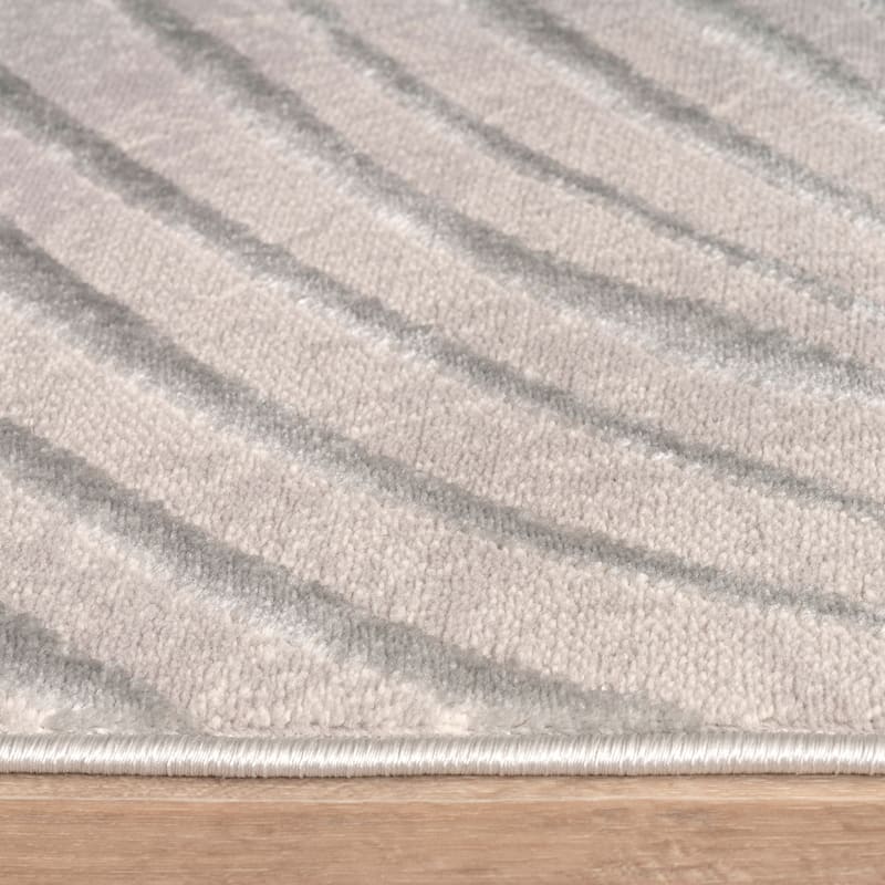Elegant Area Rug with Textured Palm Leaf Design