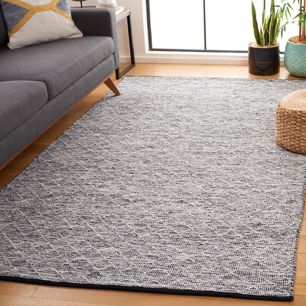 SAFAVIEH Handmade Ebony Fulvia Modern Wool Rug