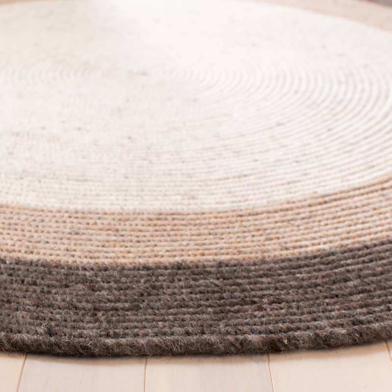 SAFAVIEH Handmade Braided Merve Wool Rug