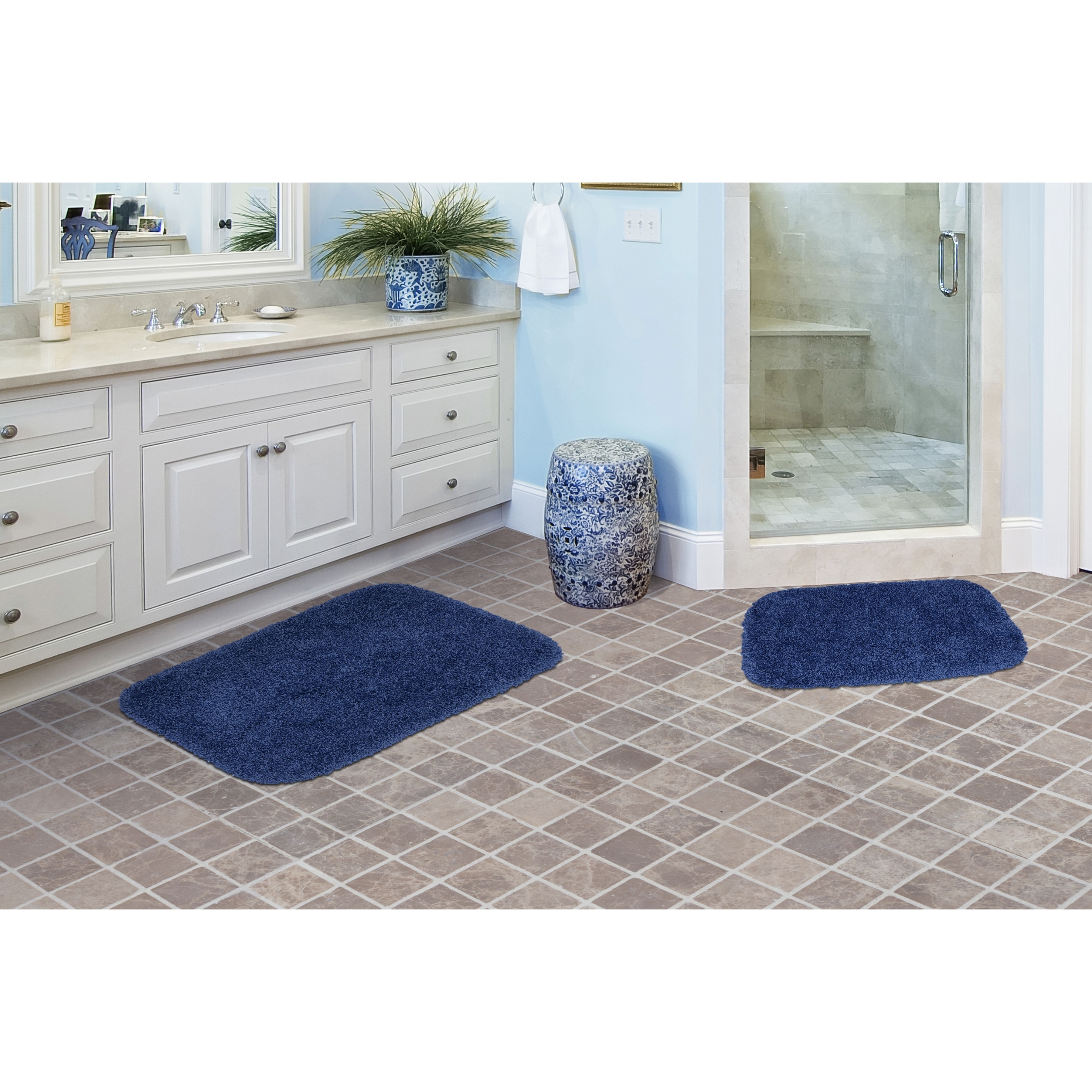 https://ak1.ostkcdn.com/images/products/is/images/direct/554e997381a703b7e01612d5b37e58d162e21179/Serendipity-Shag-Washable-Nylon-Bathroom-Rug%2C-or-Set-in-Navy.jpg