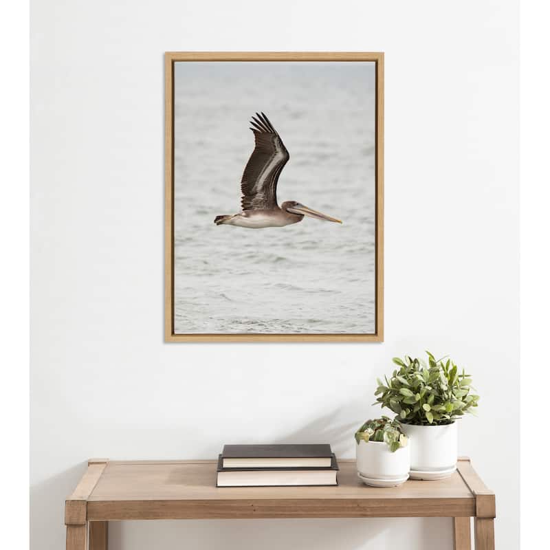 Kate and Laurel Sylvie Pelican Framed Canvas by Crystal Lynn Collins