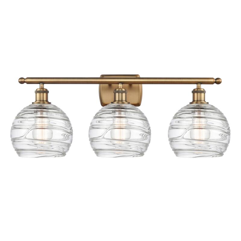 Innovations Lighting Deco Swirl 3 Light 26" Wide Bathroom Vanity Light - Brushed Brass / Clear
