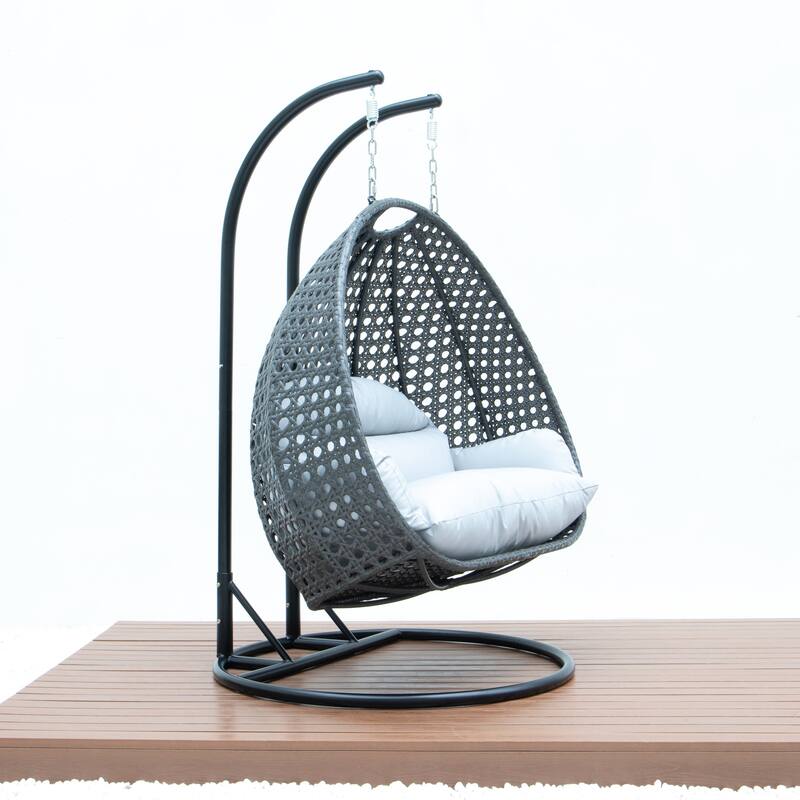LeisureMod 2-Person Hanging Egg Swing Chair with Metal Stand - Handcrafted Charcoal Wicker, Patio Hammock Lounger with Cushions