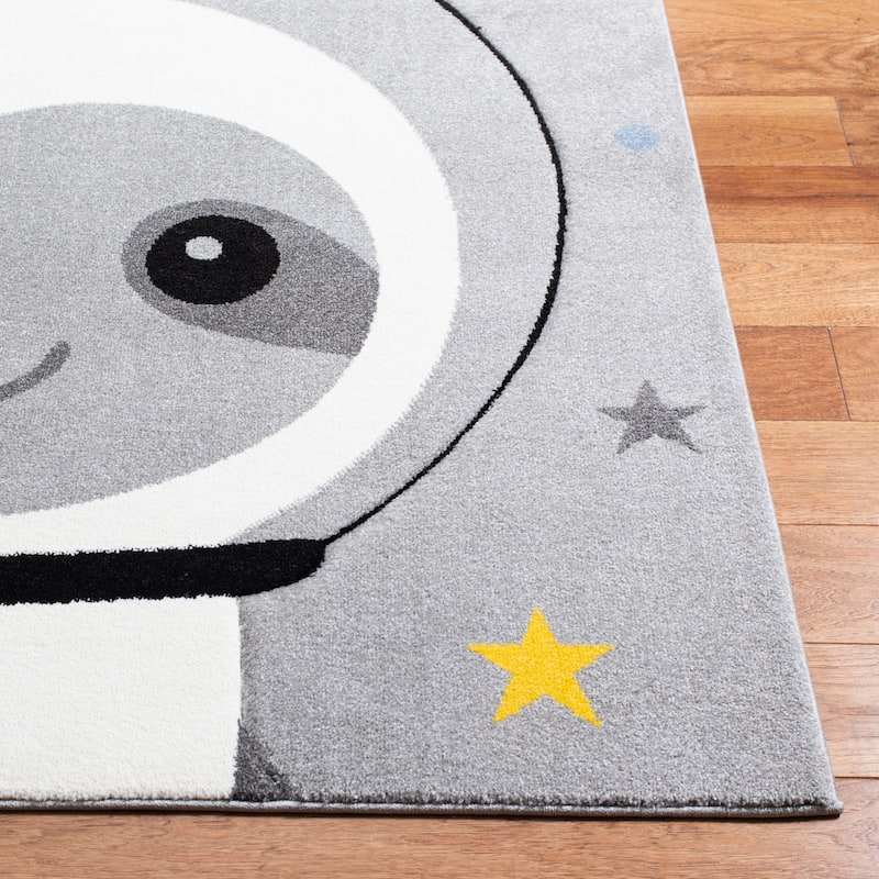 SAFAVIEH Carousel Kids Tatieana Sloth Astronaut Rug