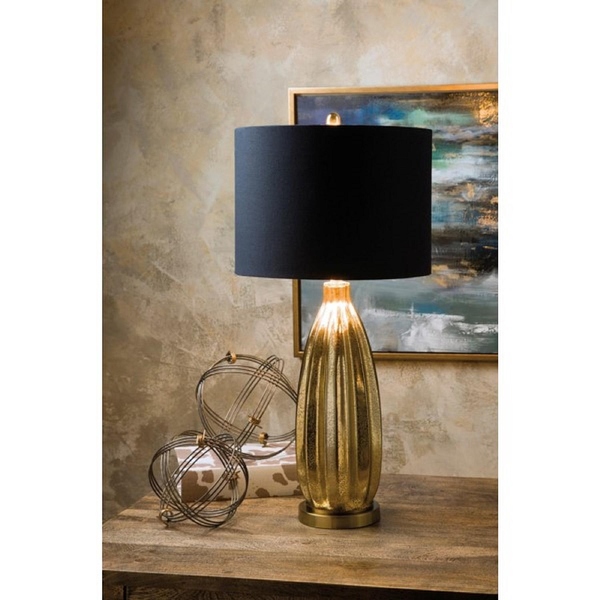 Gold lamp base with navy shade outlet