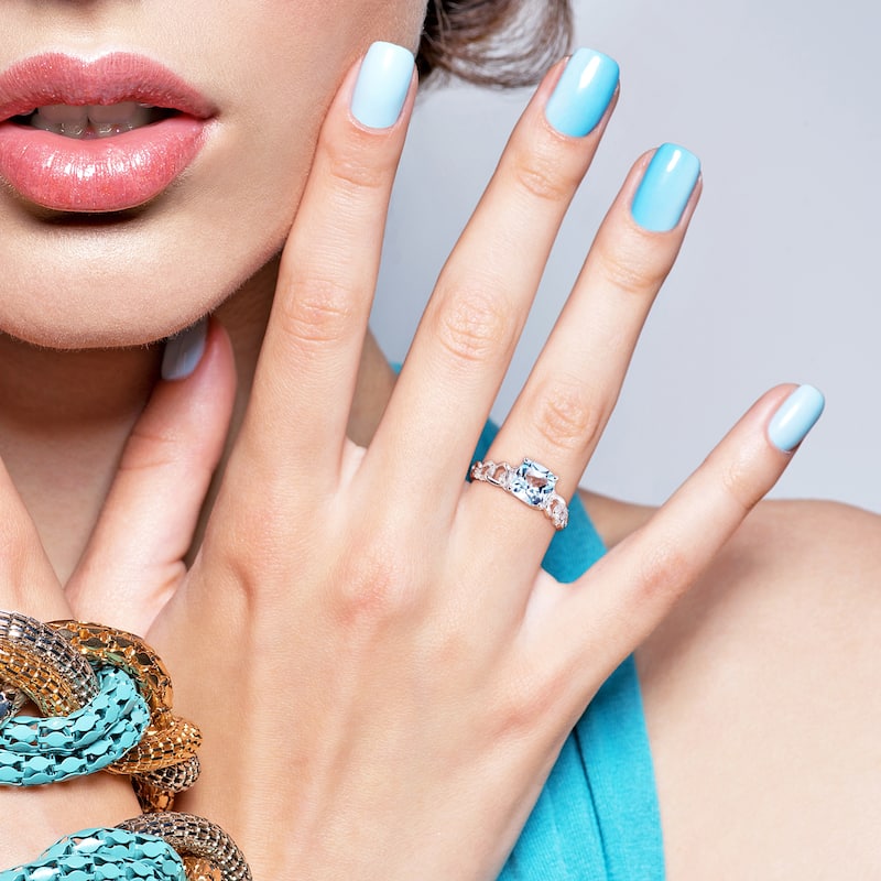 Miadora Cushion Sky Blue Topaz and 1/10ct TDW Diamond Link Engagement Ring in 10k White Gold