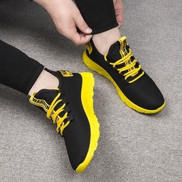 yellow sport shoes