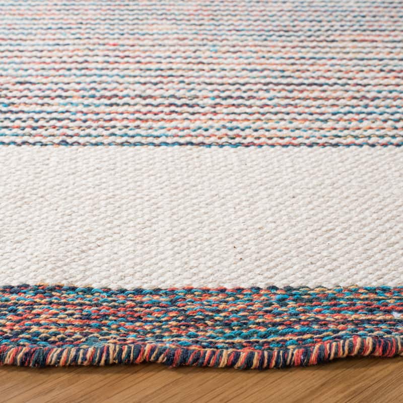 SAFAVIEH Handmade Montauk Viktorien Boho Cotton Fringe Rug