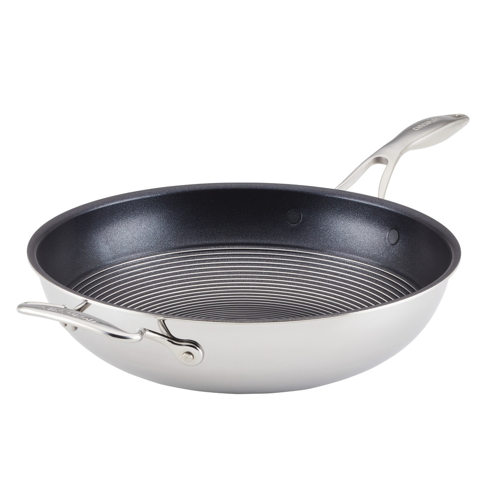 https://ak1.ostkcdn.com/images/products/is/images/direct/55e4e17c44ef34455770a67d9b1becc9d5eabe57/Circulon-Clad-Stainless-Steel-Induction-Stir-Fry-Pan-with-Hybrid-SteelShield-and-Nonstick-Technology%2C-12.5-Inch%2C-Silver.jpg