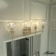 preview thumbnail 1 of 45, Hunter Xidane Vanity Wall Light - Bathroom, Mid Century Modern, Glam - Clear glass 4 Light - Alturas Gold-Clear Glass