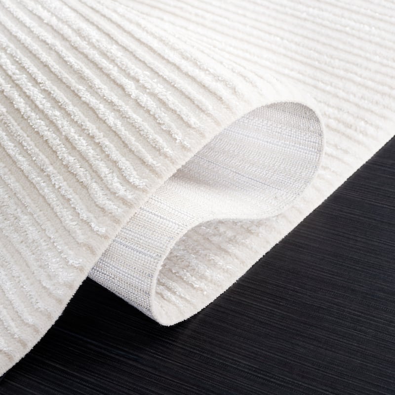 SAFAVIEH Whisper Quinty Contemporary Stripe Fringe Rug