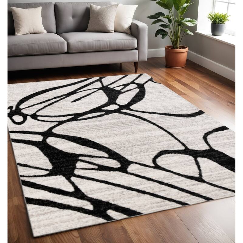HomeRoots Huvi Abstract Modern Rectangle Area Rug - 5' X 8'