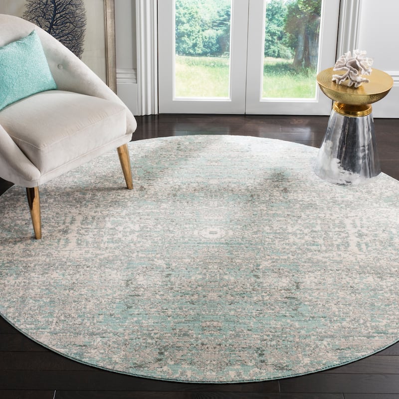 SAFAVIEH Mystique Laurette Watercolor Oriental Polyester Rug - 6'7" Round - Teal/Multi