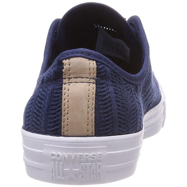 navy and white trainers