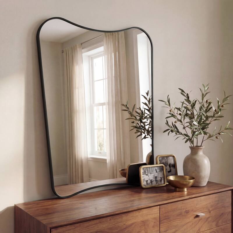 JONATHAN Y Alfie Irregular Metal Framed Wall Mounted Mirror with Flat Bottom