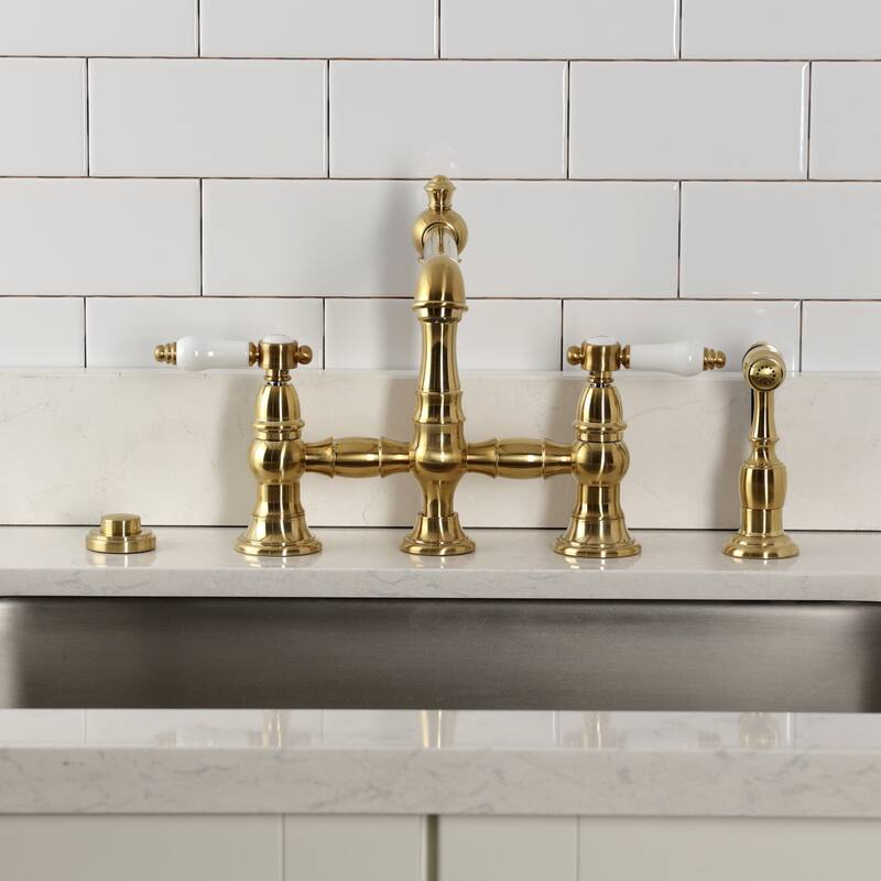 Kingston Brass Bel-Air Two-Handle 4-Hole Deck Mount Bridge Kitchen Faucet with Brass Side Sprayer