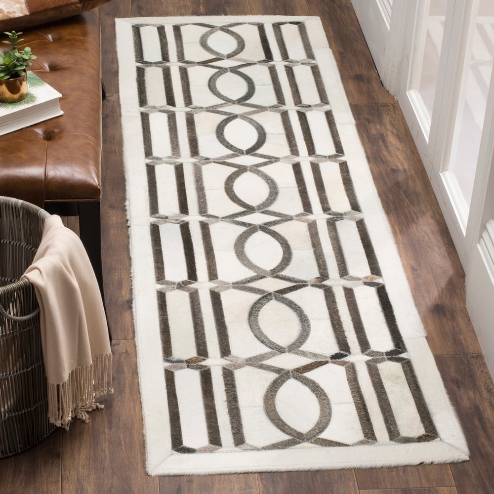 SAFAVIEH Handmade Studio Leather Mandie Modern Leather Rug