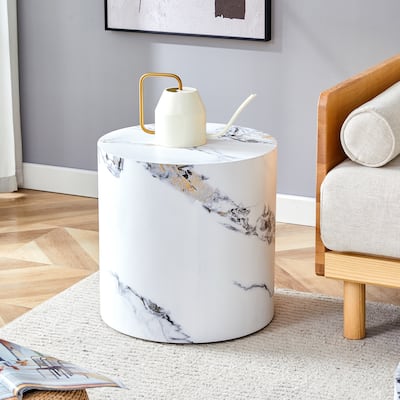 The cylindrical table with its patterned design can be easily integrated into a variety of interior styles, small dining tables