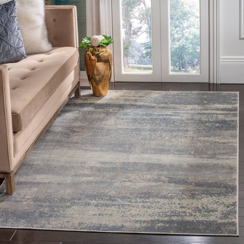 SAFAVIEH Noble Orelia Modern Oriental Polyester Rug - 8' x 10' - Light Blue/Ivory