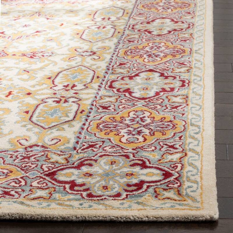 SAFAVIEH Handmade Heritage Wildfire Traditional Oriental Wool Rug