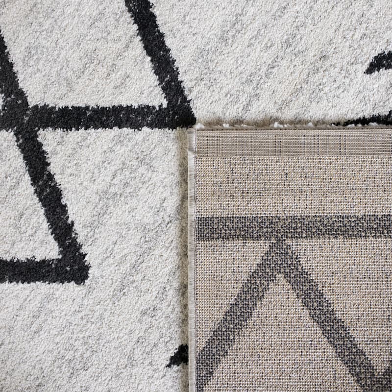 Carson Carrington Salsaker Geometric Area Rug